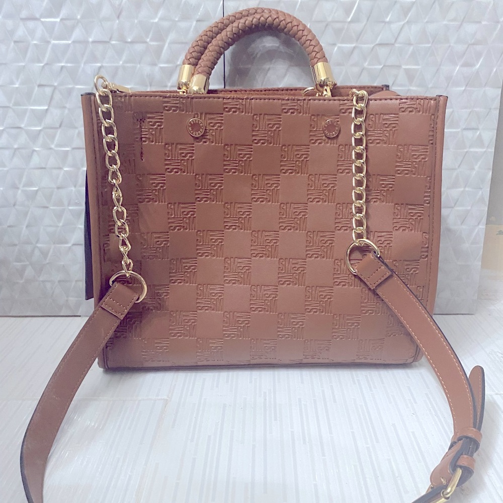 This Bjeanne Tan Steve Madden tote crossbody purse